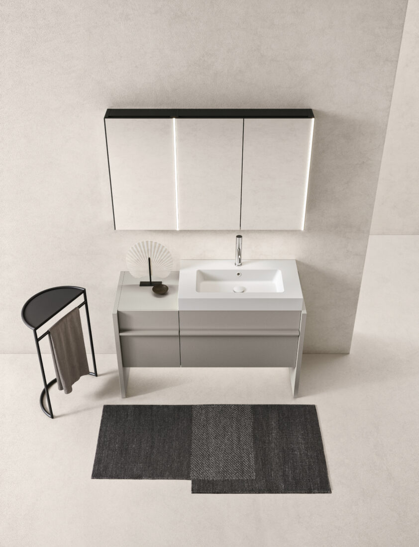 Mobile bagno bianco con lavabo e specchio, design minimalista e funzionale.