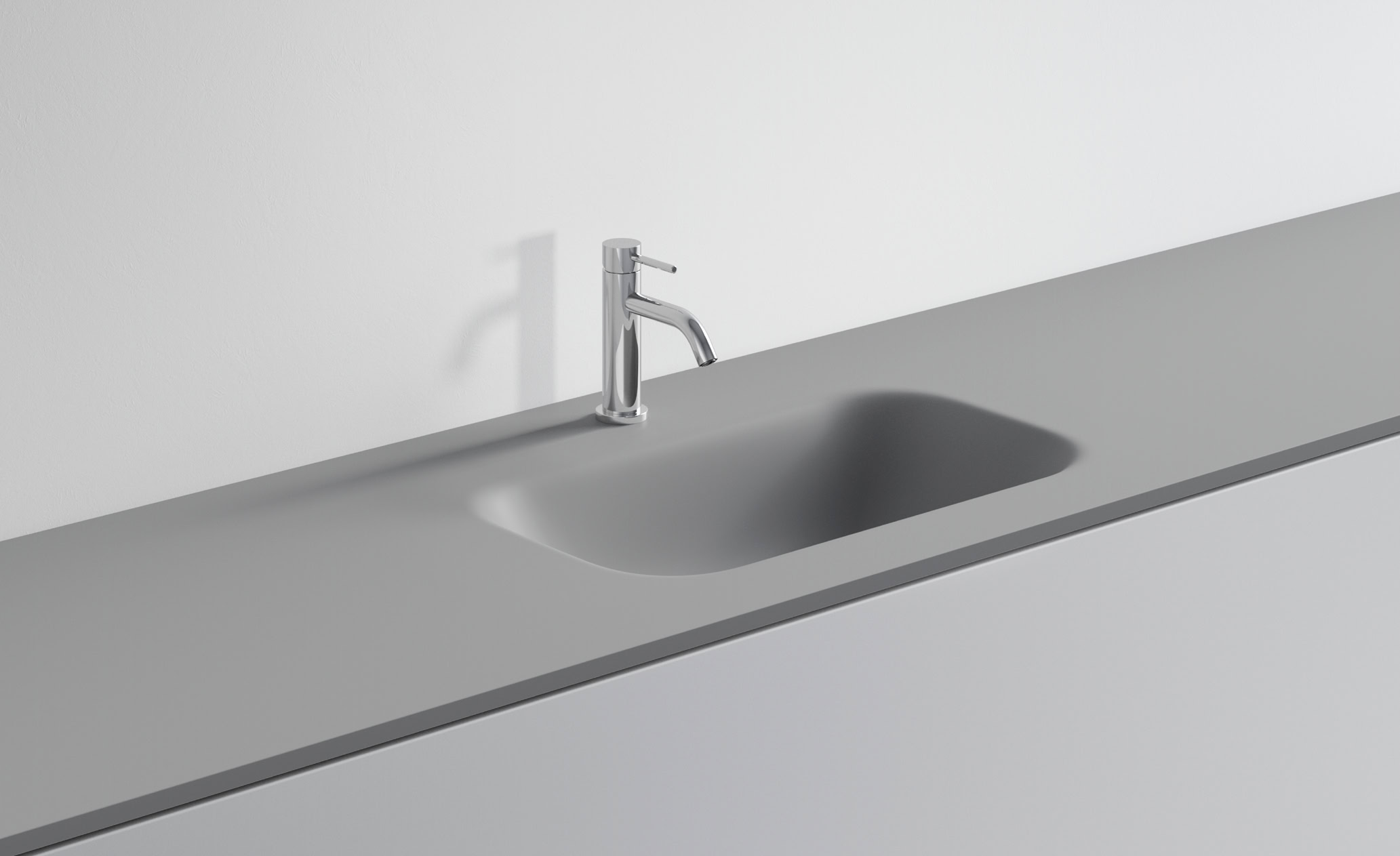 Lavandino in acciaio inox con rubinetto in cucina minimalista.
