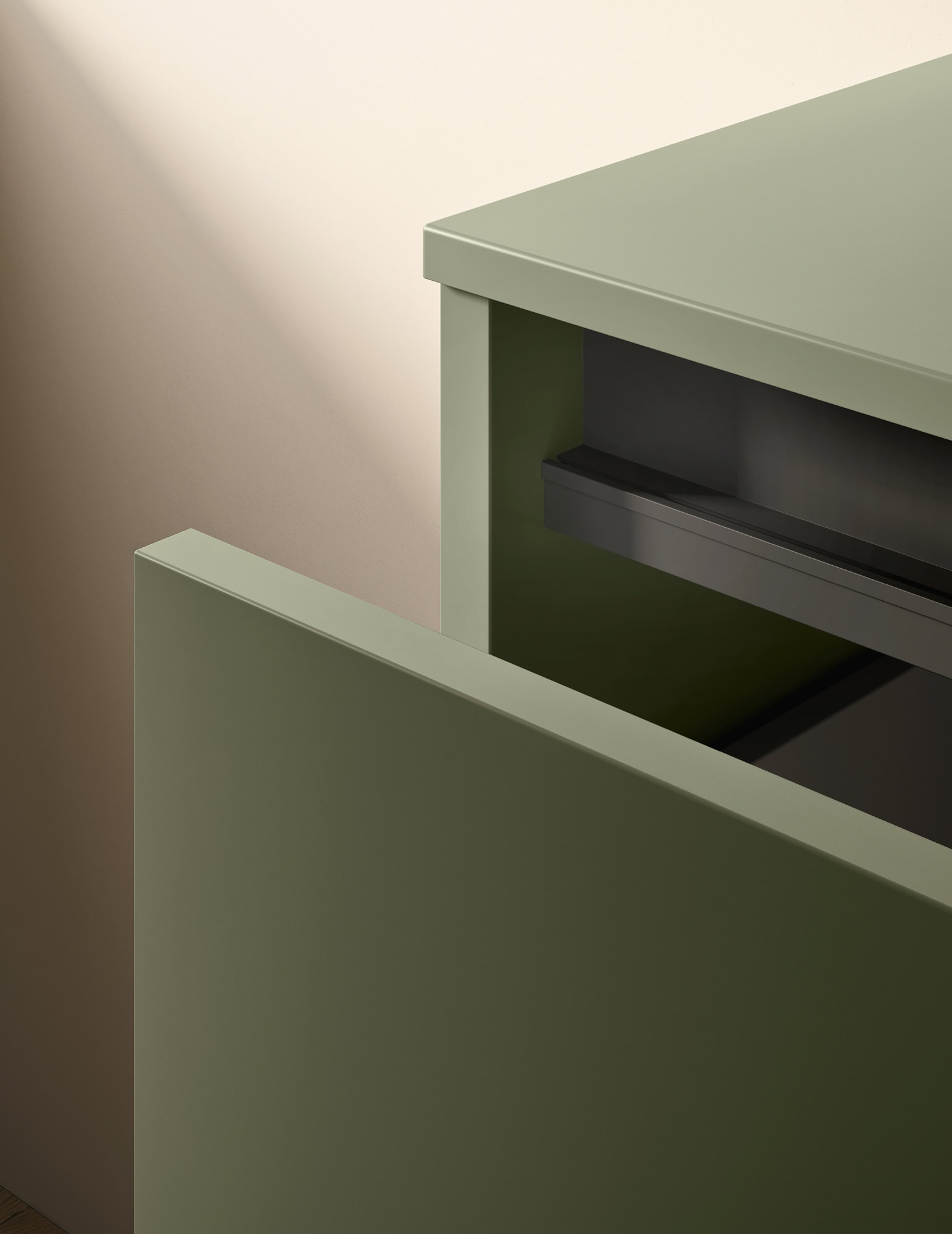 Mobiletto verde con cassetti aperti, design moderno e funzionale.