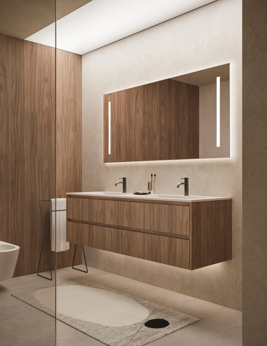 Bagno elegante con mobile in legno e specchio illuminato.