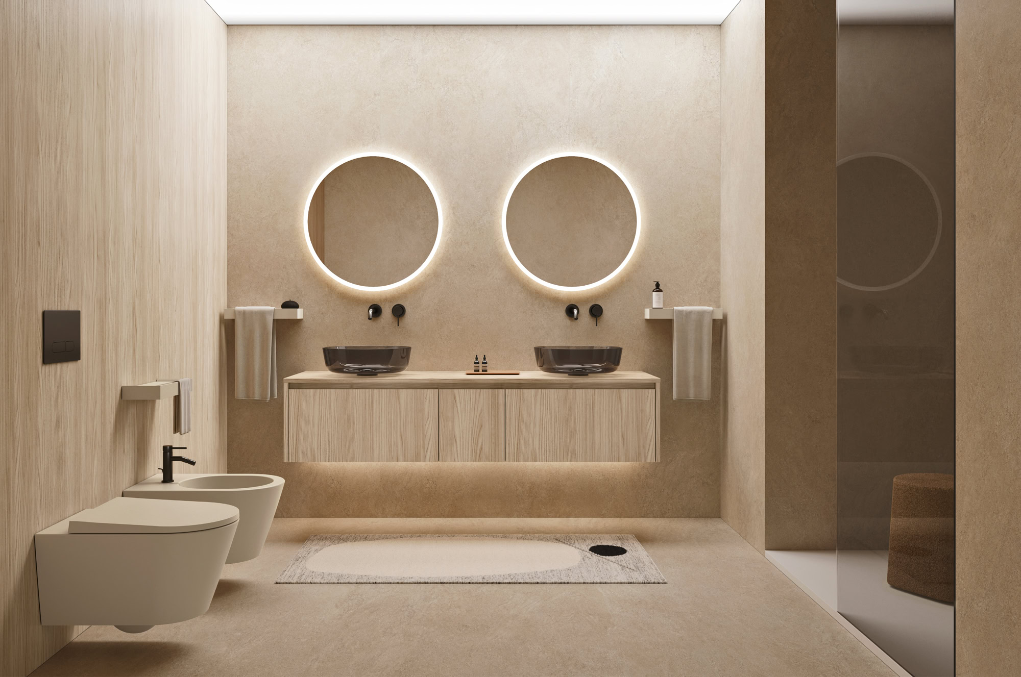 Bagno elegante con doppio lavabo, specchi con illuminazione e sanitari moderni.