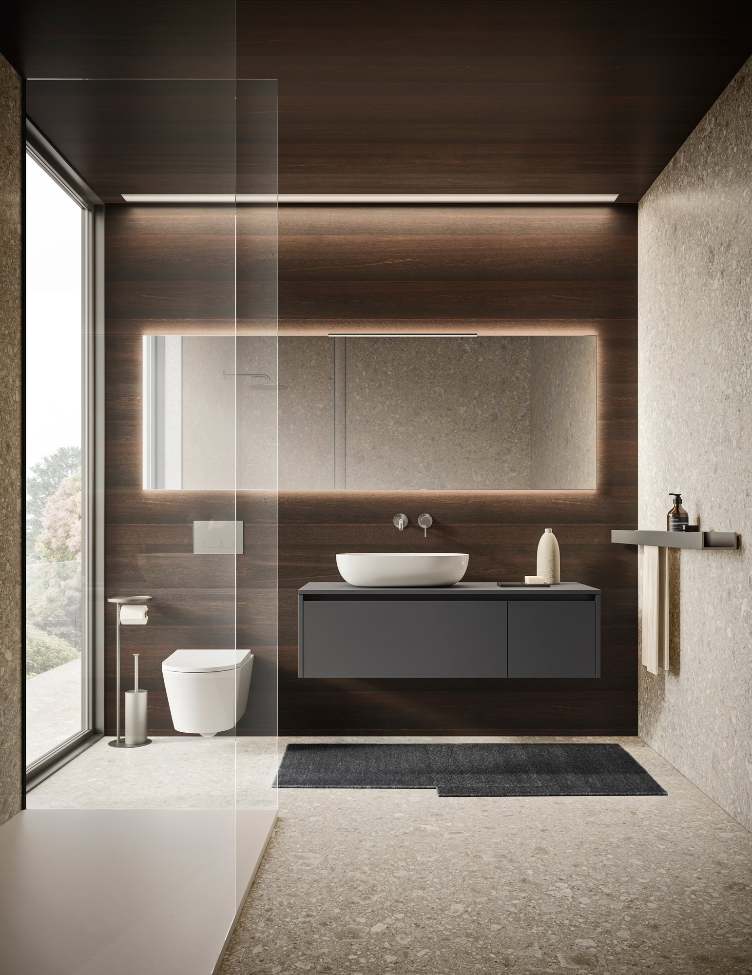 Interno bagno moderno con lavabo, specchio illuminato e WC.