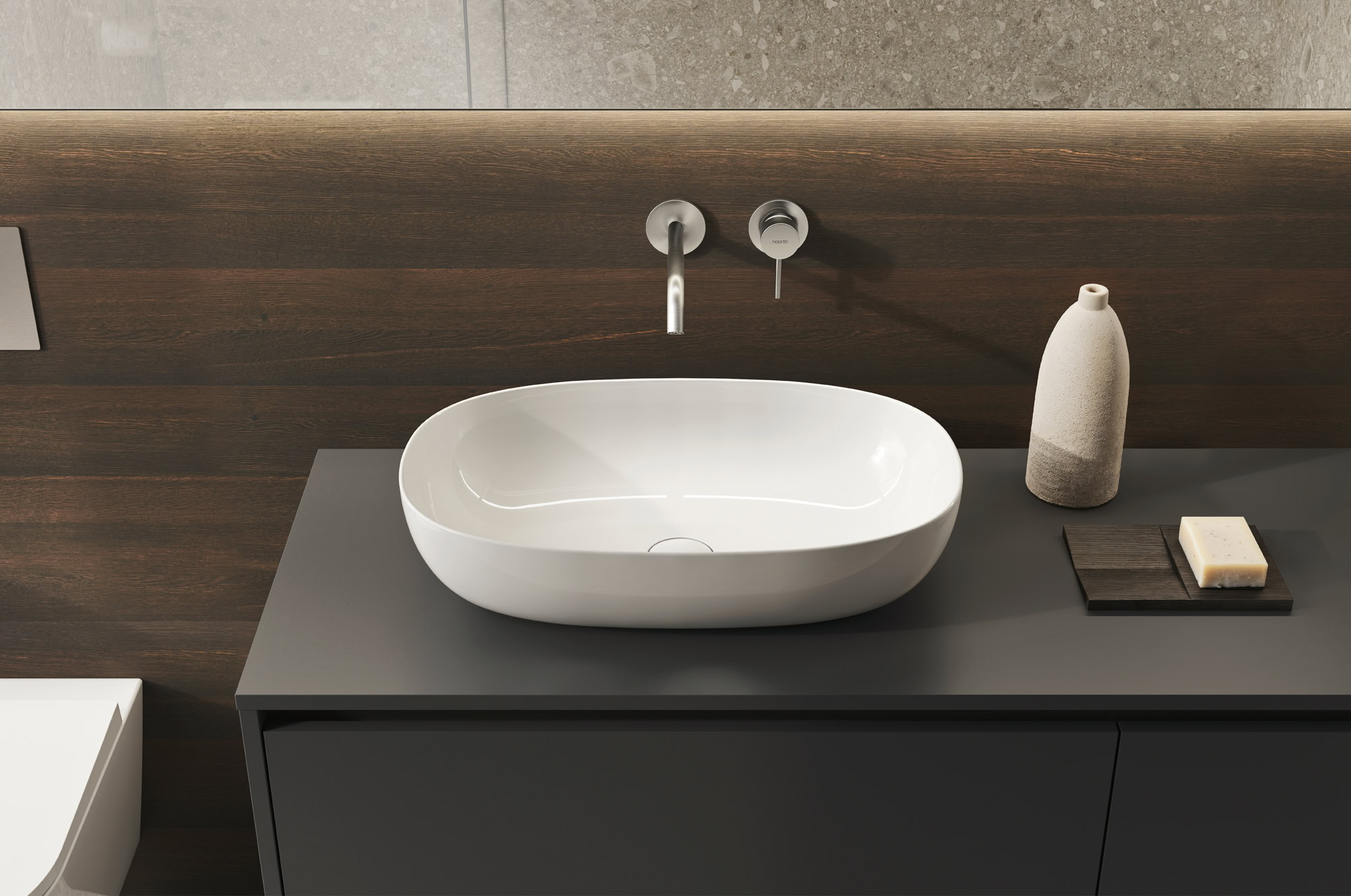 Lavabo bianco moderno su mobile grigio in bagno di design.