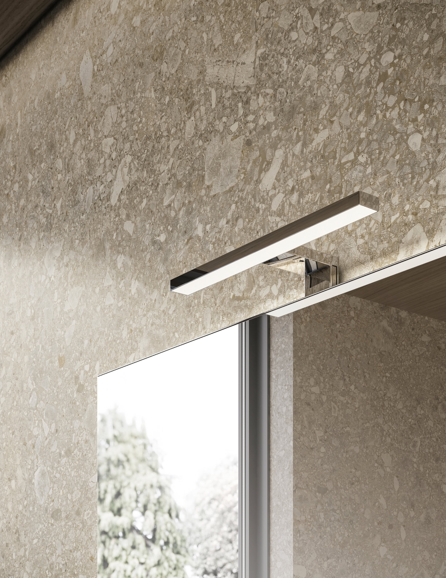 Luce a LED moderna installata sopra uno specchio in bagno.