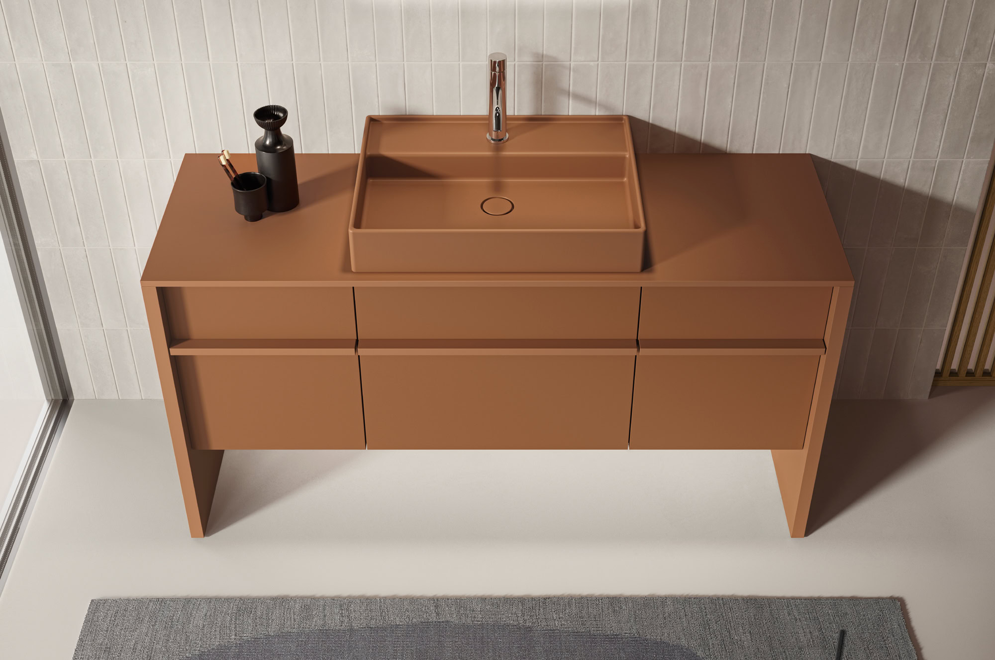 Contemporary bathroom vanity with integrated sink and minimalist design.