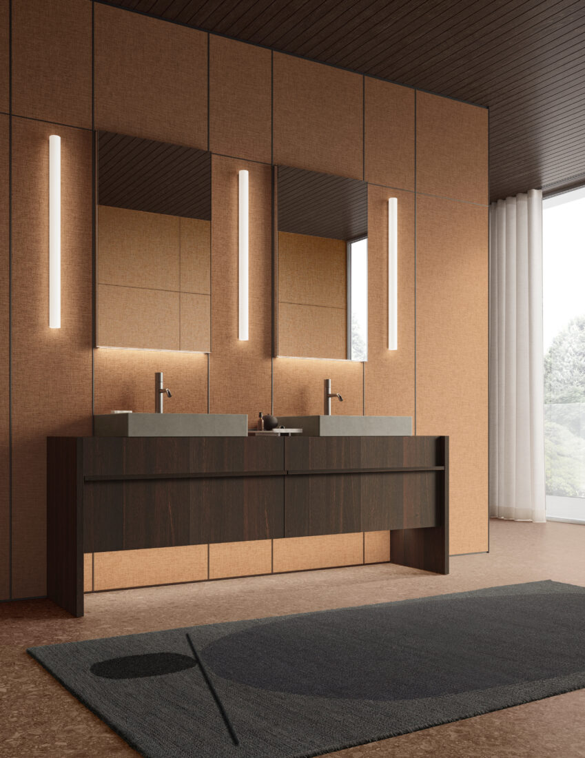 Contemporary bathroom with dual sinks, large mirrors, and warm lighting.