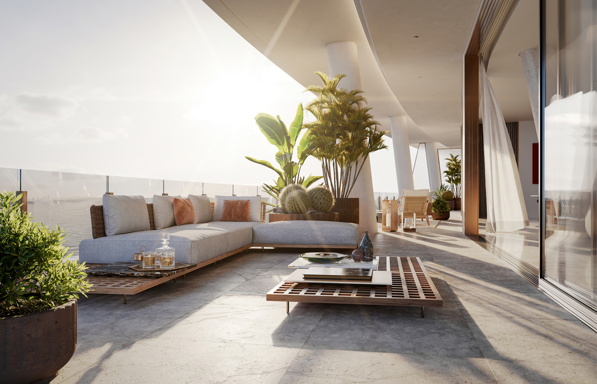 Terrazza soggiorno arredamento moderno con piante e divano.